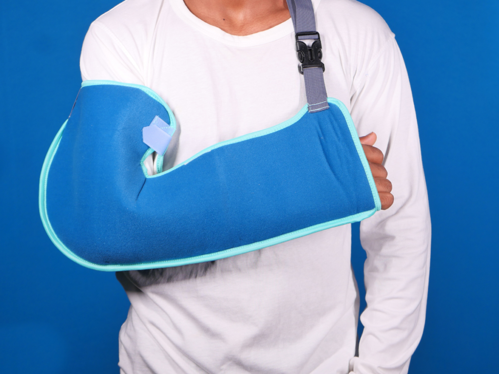 A person wearing a blue arm sleeve.